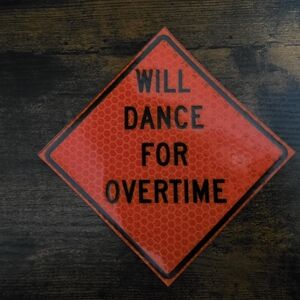 Orange 'Will Dance for Overtime' Sign